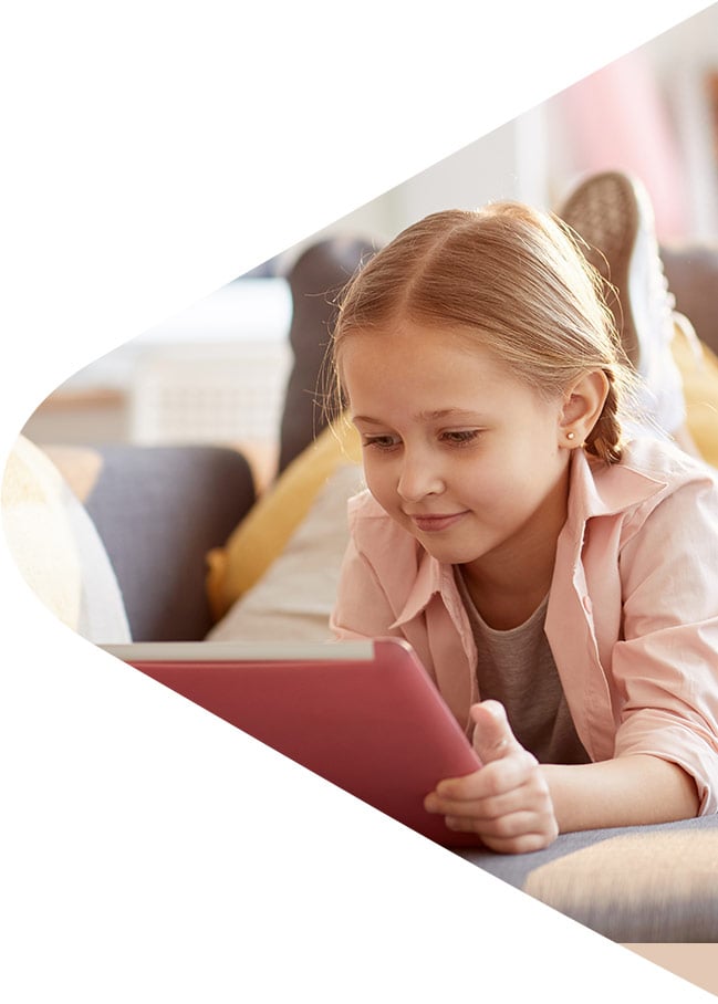 child playing on tablet